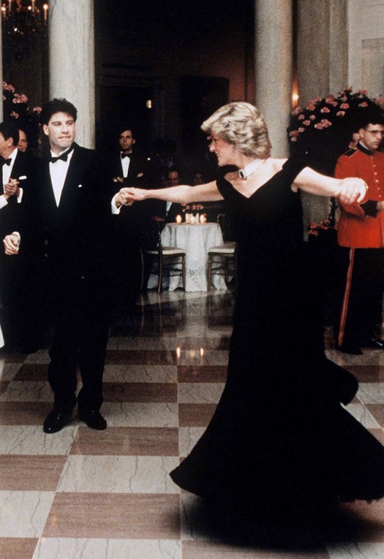 WASHINGTON - NOVEMBER 9: Princess Diana, Princess of Wales, wearing an evening dress designed by Victor Edelstein, dances with movie star John Travolta at the White House during her visit to America on November 9, 1985 in Washington DC, U.S.A. (Photo by Anwar Hussein/Getty Images)