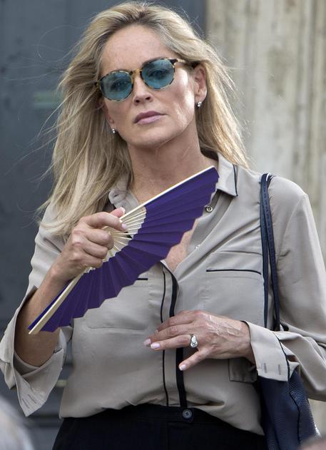  Sharon Stone gets ready to shoot a scene during the filming of the movie 'Il ragazzo d'oro' (The golden boy) in Rome, Italy, 18 July 2013 on the first day of shooting of the new movie of Italian director Pupi Avati. ANSA/MASSIMO PERCOSSI